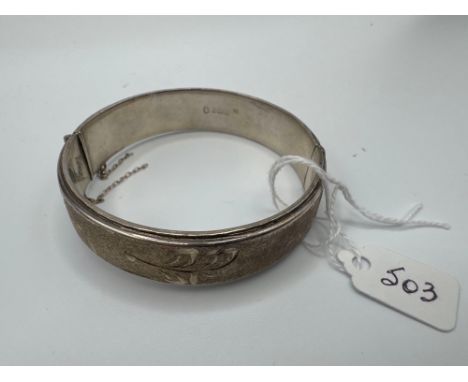 A hinged silver bangle 23 gms