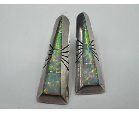 A pair of silver and opal earrings signed BENALLY