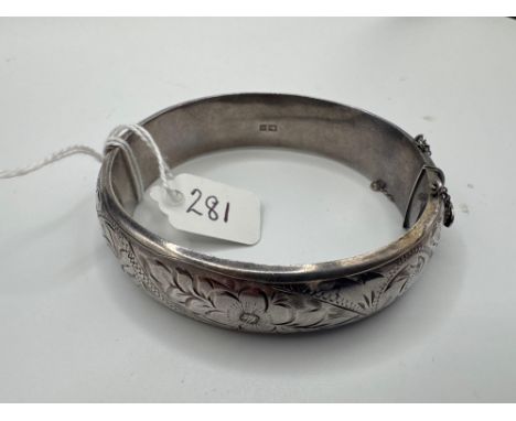 A hinged silver bangle 25 gms