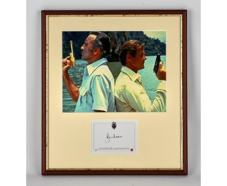 The Man With the Golden Gun (1974) Christopher Lee and Roger Moore framed display, with an inset card signed by Roger Moore a