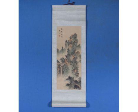 A Chinese miniature painted scroll on paper, depicting a river landscape fully signed with artists red seal, 19" x 7"