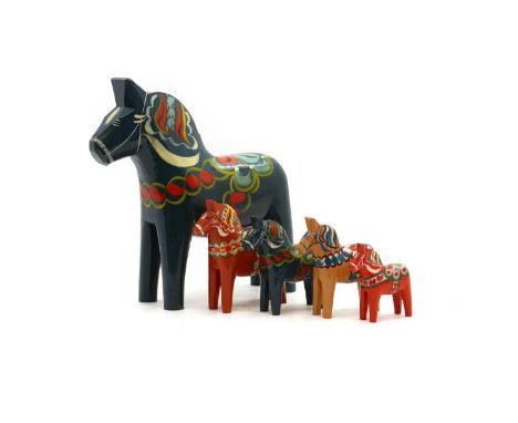 A set of five Swedish painted 'Dala' horses,late 20th century, painted, 31 to 10.5cm high (5)Provenance: The Estate of John G