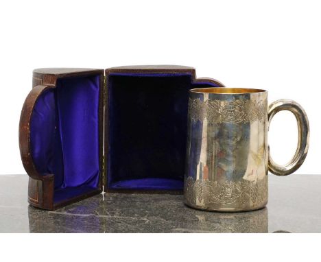 A Victorian silver mug,by Goldsmiths Alliance Ltd, London 1877, with engraved foliage and fruit, the interior gilt,13.5cm hig
