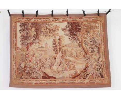 An Aubusson tapestry panel,late 19th/early 20th century, depicting a lion and a bird in a country house garden,180 x 253cmCon