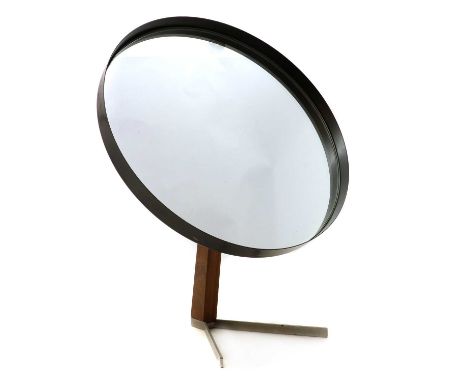 A teak and enamelled table mirror, 1960s. by Durlston Designs, raised on a tapering stem terminating onto a cast steel base, 