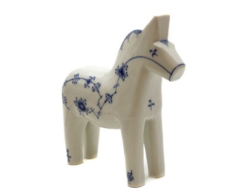 A Royal Copenhagen porcelain 'Blue Fluted Plain' Dala horse,modelled in a standing position, printed and painted marks,17.2cm