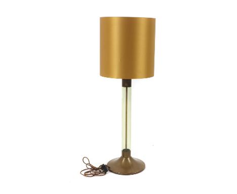 An Italian table lamp,by Gabriella Crespi, with a plain lucite column, with copper mounts, fitted with a gold fabric shade, 9