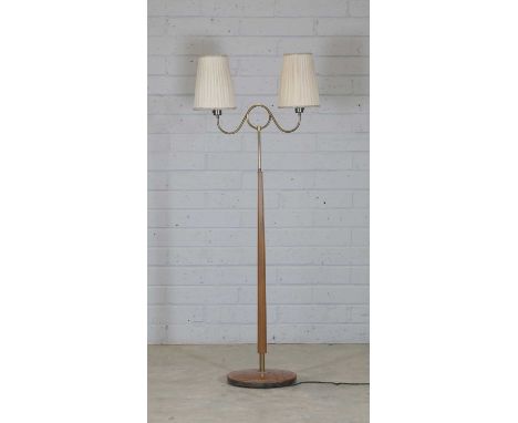 A Swedish twin-branch standard lamp, 1960s, with brass branches, and a teak mounts,Provenance: The Estate of John Graham (192