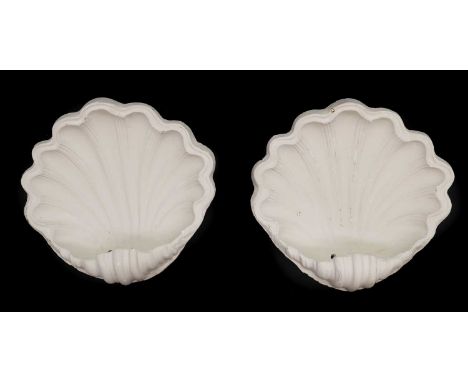 A pair of plaster shells, 34cm wide 13cm deep30cm high (2)Condition ReportWith loop fixed to the back. Chips to the edges.