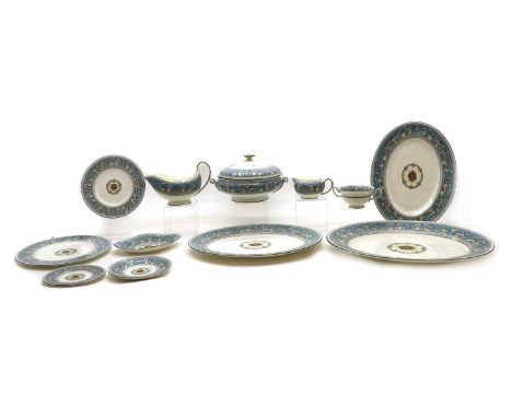 A Wedgwood Florentine porcelain dinner service,comprising three tureens, 25cm wide, three sauceboats, 20cm wide, a cream jug,