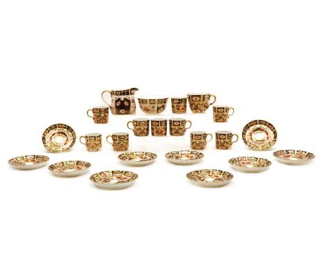 A collection of Royal Crown Derby imari tea wares,20th century, pattern no. 2451, comprising ten coffee cans and saucers, the