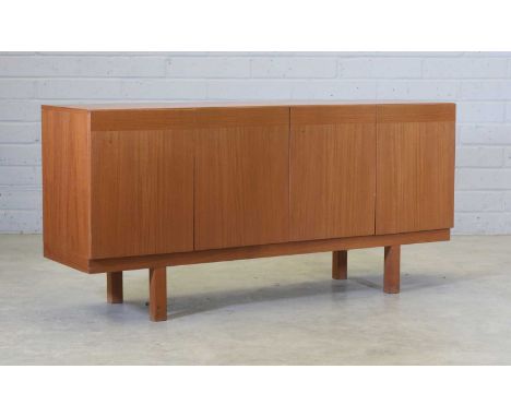 A Danish teak sideboard,fitted with two pairs of cupboards, with maple lined interiors and single shelves, on block supports,