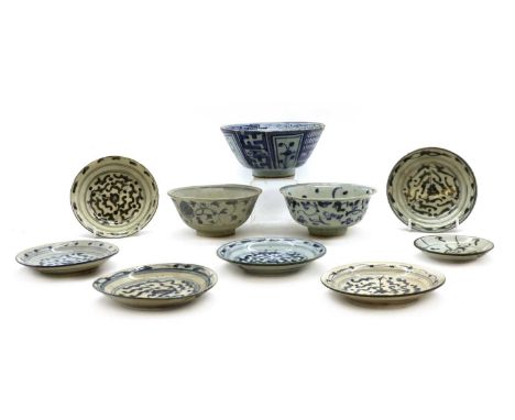 A collection of blue and white pottery saucers and bowls,16th-19th century, Southeast Asian, comprising seven saucers, and th