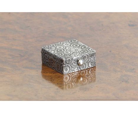 A Japanese silver stamp box,Jungin character mark, decorated with flowers, 3.5cm squareCondition ReportMinor dents to the int