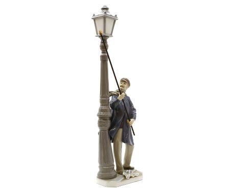 A Lladro porcelain figureof recent manufacture, modelled as a lamp lighter, marks to base,47.5cm high Condition ReportNo obvi
