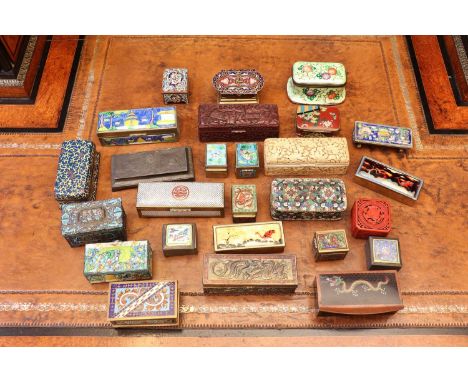 A collection of cloisonne stamp boxes,20th century, predominately Chinese, decorated with floral and dragon motifs, and furth