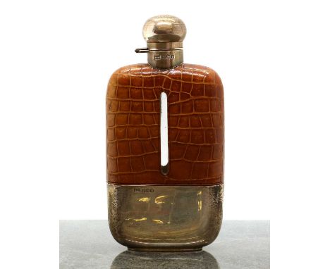 A silver, leather and glass hip flask,by Walker &amp; Hall, Sheffield 1929, the hinged locking cover below a three quarter le