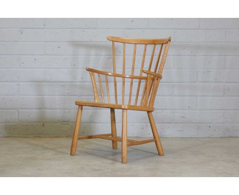 A Danish Model 1638 Windsor armchair,1960s, designed by Ove Boldt in 1947 for Fritz Hansen, 61cm wide 62cm deep89cm high, sea