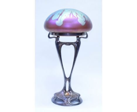 An Art Nouveau electroplated table lamp, the design attributed to Gustav Gurschner, the shade manufactured by Loetz, unmarked