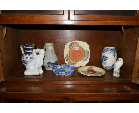 A mixed lot of ceramics, to include: two Clarice Cliff Spring Crocus plates; a Crown Staffordshire owl; a Victorian Staffords