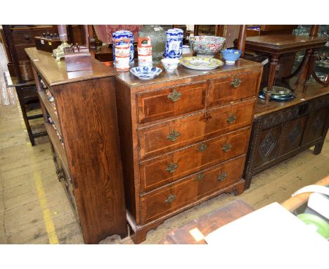 An 18th century walnut and crossbanded chest of drawers, with a moulded edge caddy top above two short and three graduated dr