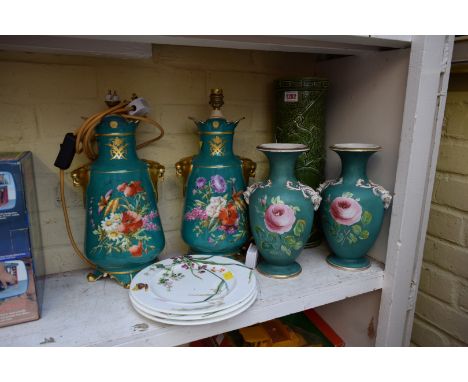 A Bretby Japanesque vase, 39.5cm high, (restored); together with two further twin handled pottery vases; and a set of three M