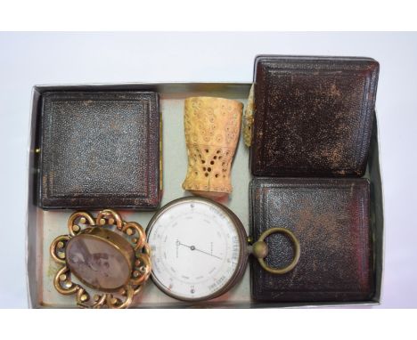 An antique pocket aneroid barometer, the dial inscribed 'Brown, Edinburgh'; together with three Victorian 'Hampstead Norreys 