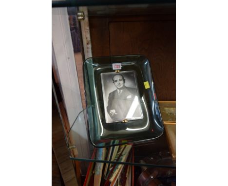 A vintage green glass easel back photograph frame.