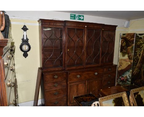 A George III mahogany breakfront secretaire bookcase, 234.5cm wide.  Condition Report: Condition of this item is commensurate