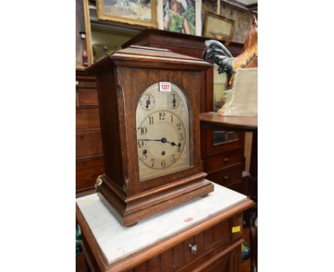 An early 20th century Kienzle oak Westminster chiming mantel clock, 40.5cm high.