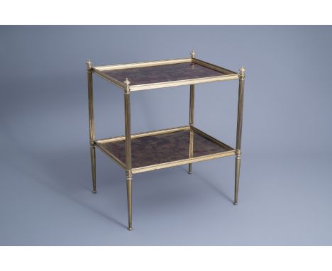 Title: Maison Bagus, Paris: A rectangular gilt bronze two tier mirror tray side table, third quarter 20th C.Description: H 57