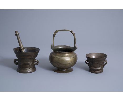 Title: A brass holy water bucket and two bronze mortars and a pestle, Italy and the Low Countries, 16th/17th C.Description: H