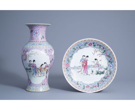Title: A Chinese famille rose vase and a charger with ladies in a garden, 20th C.Description: H 42,5 cmÊ Dia.: 33,6 cm