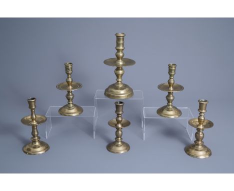 Title: Six brass and bronze disc or so-called 'heemskerk' candlesticks, the Low Countries, 17th C. and laterDescription: H 27