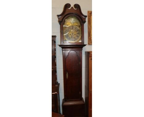 ~ An oak eight day longcase clock, 18th century, arch brass dial with applied plaque inscribed E.Foster, Carlisle