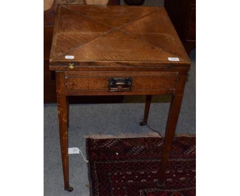 An Edwardian oak and parquetry envelope card table, 49cm wide