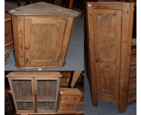 A miniature pine chest, 33cm wide; a pine wall mounted glazed cabinet; a pine corner cupboard with panel door; and a pine fre