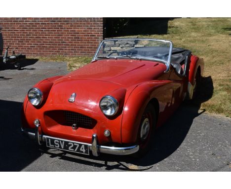 A 1954 Triumph TR2 long door, registration number LSV 274, chassis number TS 3044, red.  Early long door TR2s are highly soug