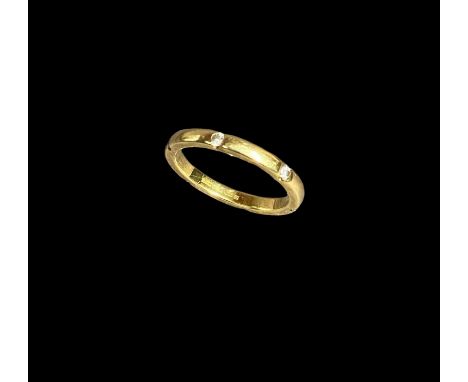 An 18ct gold eternity ring set with 6 small diamonds 4g  size Q