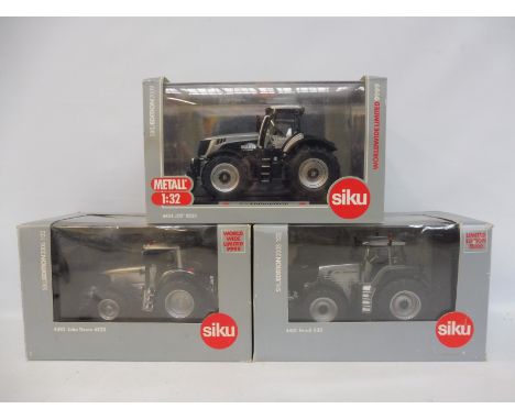 Three Siku 1/32 scale models including JCB 18250 and models 4481 and 4482.