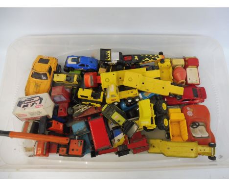 A box of vintage Tonka toys, various conditions. 