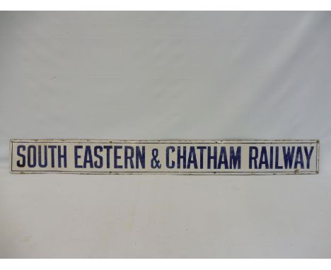 A South Eastern &amp; Chatham Railway narrow enamel sign, small area of professional restoration, 52 3/4 x 5 3/4". 