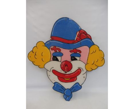 A large scale circa 1970s clown hoopla game with a cheat mechanism to the rear.