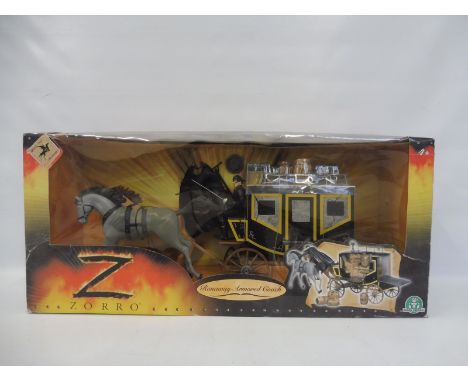 A large scale boxed Zorro - a Runaway Armoured Coach, appears in excellent condition. 