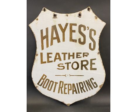 A pair of early shaped enamel signs mounted back to back advertising Hayes's Leather Store and Boot Repairing, 18 x 23 1/2".