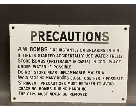 A 'Precautions' A.W. Bombs... rectangular enamel sign in excellent condition, 12 x 8". 