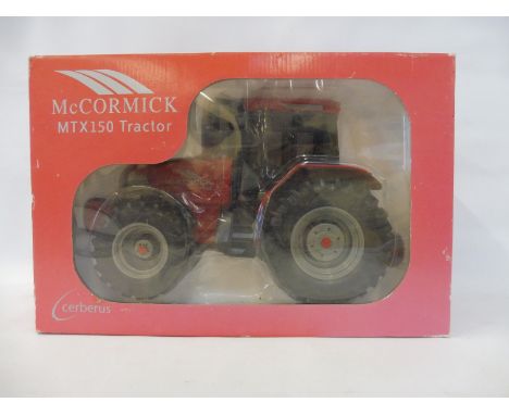 A boxed 1/16 scale McCormick MTX150 tractor. 