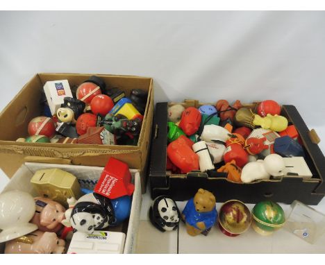 Three large boxes of plastic, plaster and ceramic money banks etc.