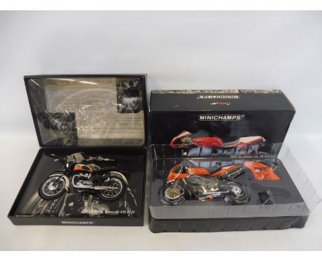 Two scale models of motorcycles: a Minichamps Ducatti 996 and the 1/12 scale Triumph Bonneville 650.