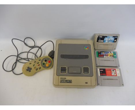 A Nintento Super Nintendo game console with games (unchecked). 
